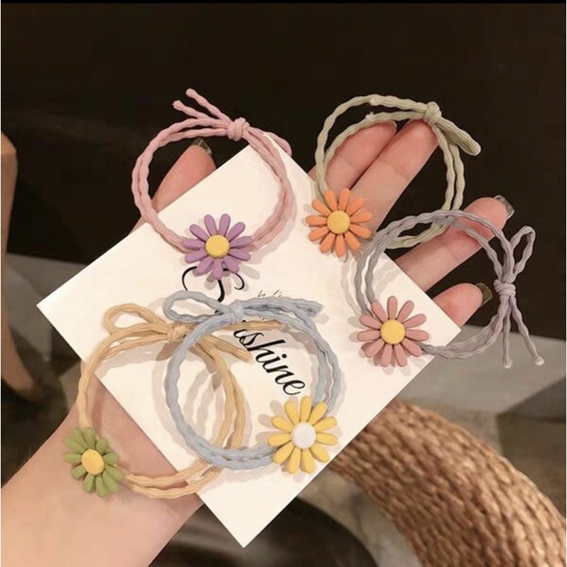 Thun cột tóc hoa cúc
