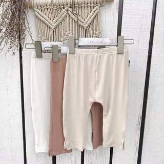 Quần legging ngố xẻ tà