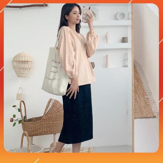 Chân váy midi cotton đen xẻ tà sau