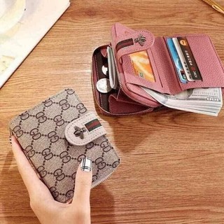 Ví cầm tay con ong nữ