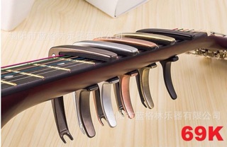 Capo đàn guitar Acoustic và Classic