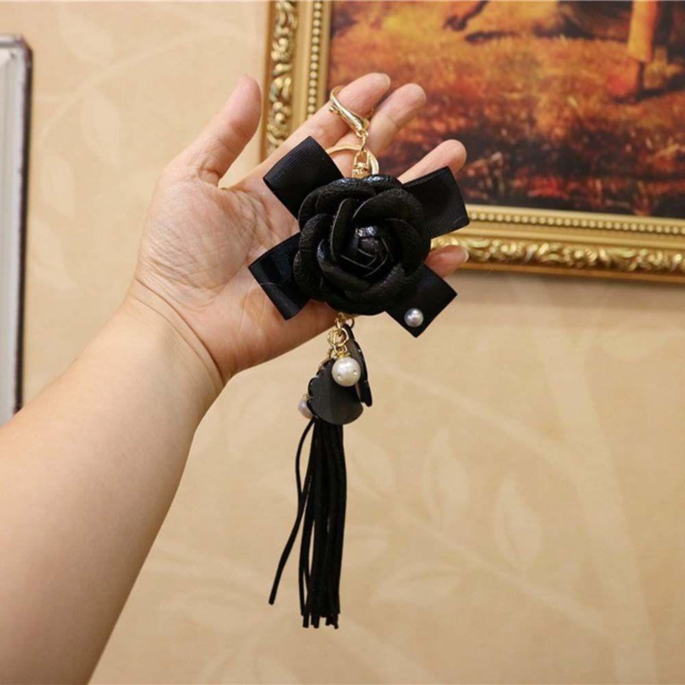 Móc Khóa Hình Hoa Trà Màu Đen Xinh Xắn