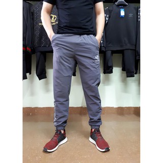 Quần gió adidas