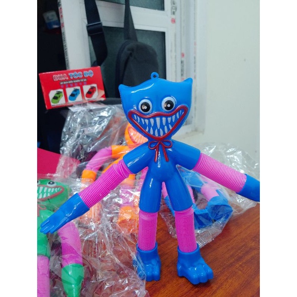 Đồ chơi Huggy Wuggy Ống Lò Xo Biến Hình . có đèn sáng .Loại to 30 cm phần tay và chân có thể kéo ra tùy ý