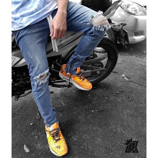 Quần jean rách gối nam Streetwear DATINO khoá Zipper màu xanh chất liệu Denim co giãn, bền màu giặt tay giặt máy.