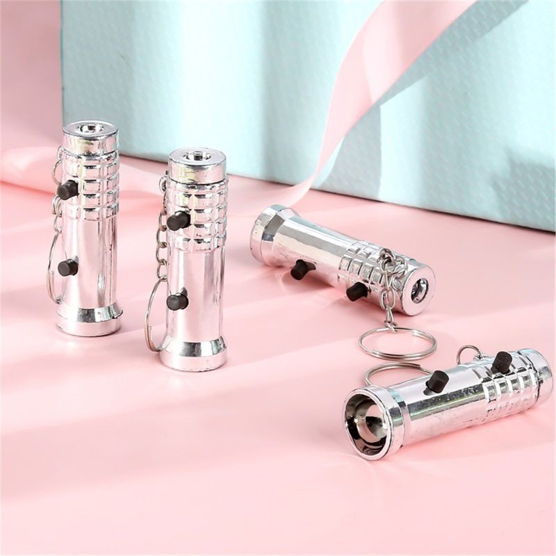 Móc Khóa Đèn Pin Chiếu Tia Uv 2 Trong 1 Cho Bé