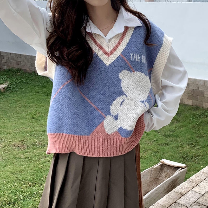 Set áo sơ mi dài tay và áo len không tay thời trang có bán lẻ