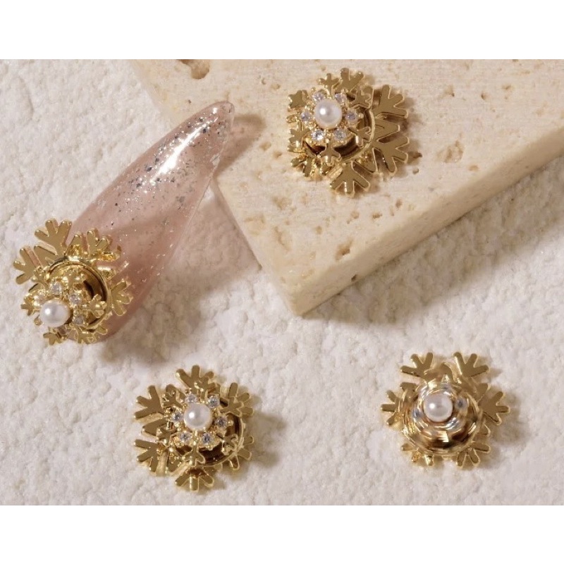 Charm xoay hình bông tuyết