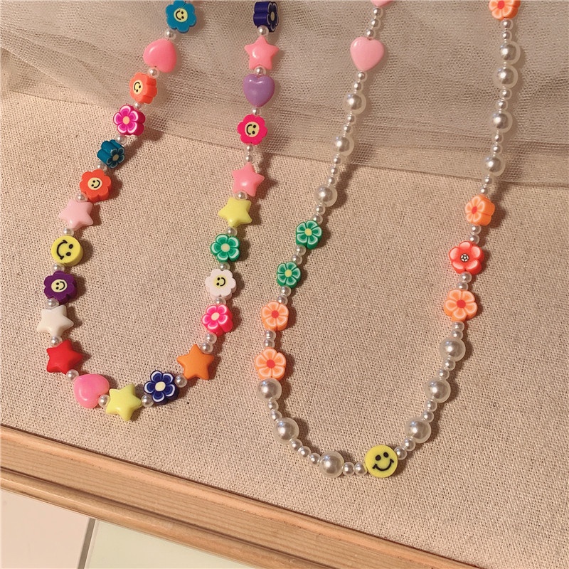 Vòng cổ choker Hishop đính hạt ngọc trai mặt cười ngôi sao dễ thương phong cách Hàn Quốc cho nữ