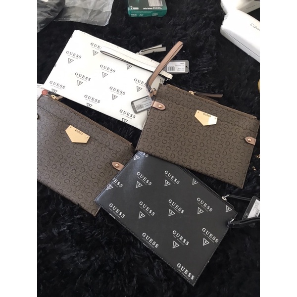 Ví cầm tay nữ guess logo  us