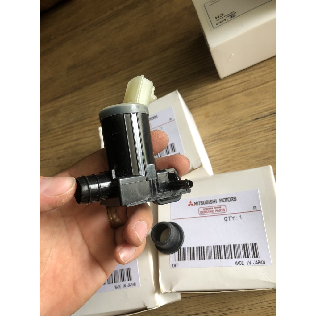 MÔ TƠ BƠM XỊT NƯỚC RỬA KÍNH MITSUBISHI XPANDER