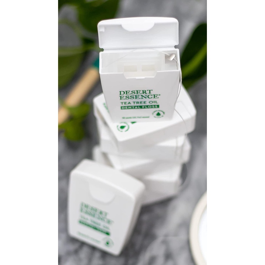 CUỘN 45m CHỈ NHA KHOA PHỦ TINH DẦU TRÀM TRÀ ÚC - SÁP ONG TỰ NHIÊN BẢO VỆ NƯỚU Desert Essence Tea Tree Oil Dental Floss