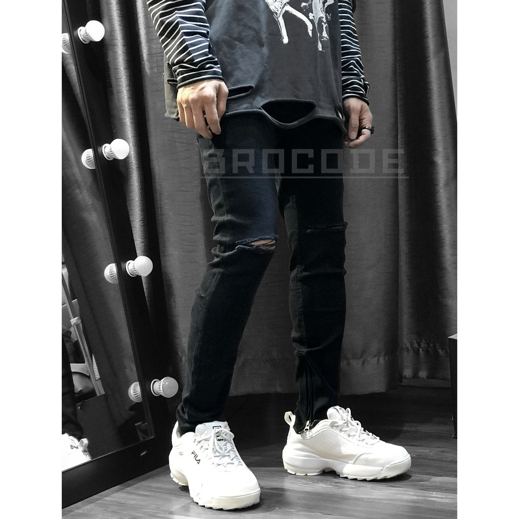Quần skinny jeans đen rách gối phối zip