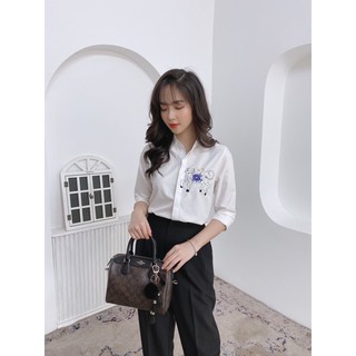 Sơ mi trắng thêu trâu