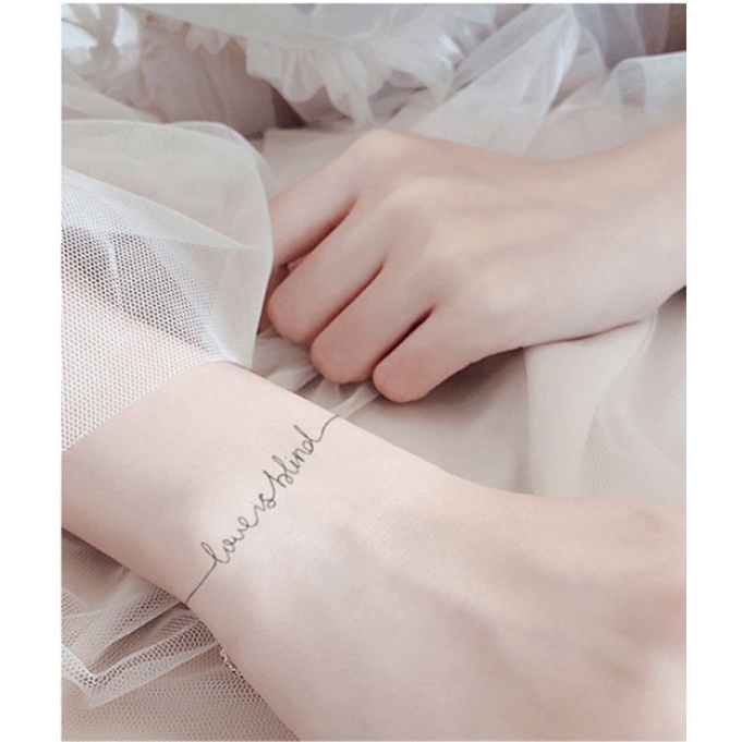 Hình xăm chữ love is blind l10 a23. Xăm dán tatoo mini tạm thời, size &lt;10x6cm