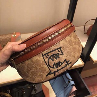 Túi bao tử Coach tròn nâu da thật