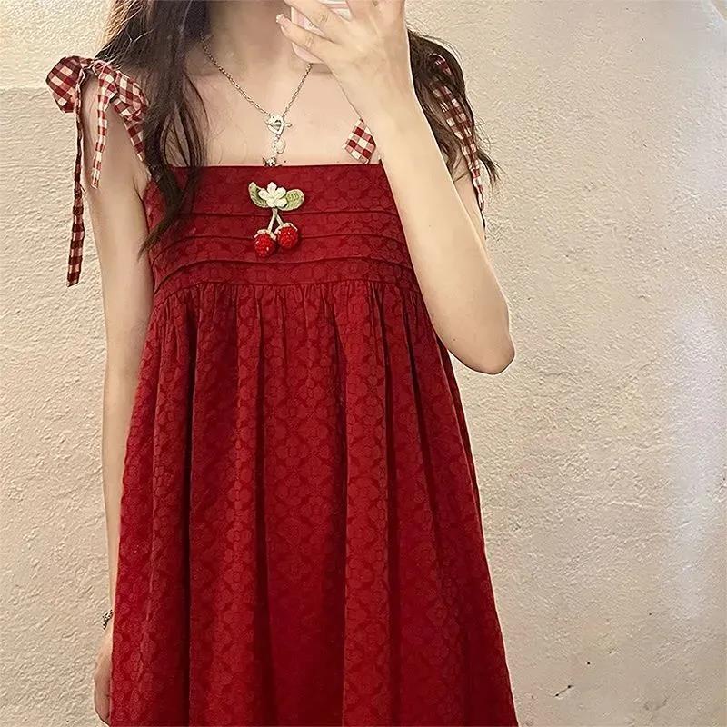 Set Đầm Hai Dây + Áo Choàng Chống Nắng Tay Phồng Đính Nơ Hoạ Tiết Dâu Tây Dễ Thương Xinh Xắn Cho