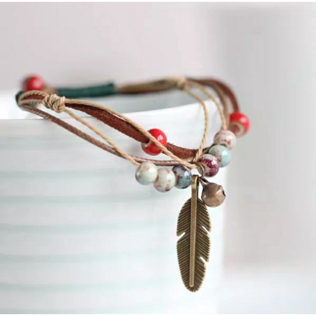 Vòng tay đất sét hoa charm chiếc lá