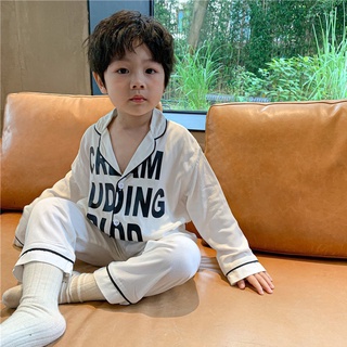 Bộ Pijama cho bé trai Kangmin kids, đồ bộ quần áo ngủ pizama cho bé trai gái PM18 chất lụa trơn in chữ dài tay từ 6-28kg