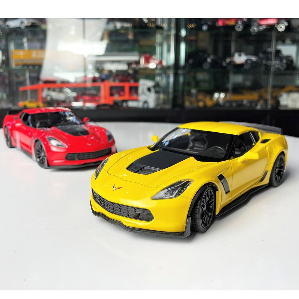 Mô hình xe kim loại Chevrolet Corvette Z06 tỉ lệ 1:24 hãng Welly màu vàng