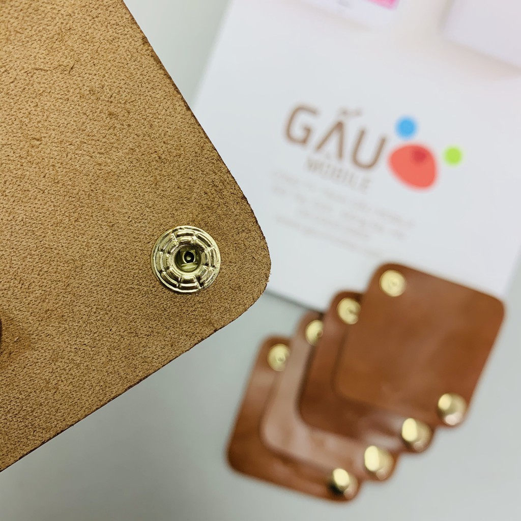 Bao da cuốn bảo vệ dây sạc