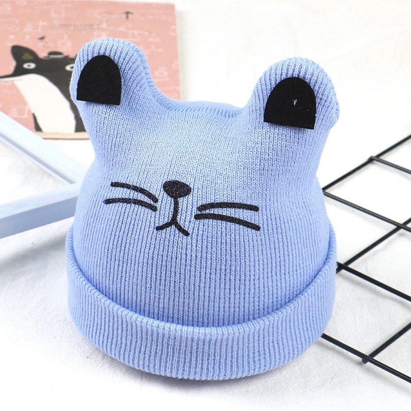Mũ len hình mặt mèo chất liệu len gọn nhẹ giúp giữ ấm cả đầu và tai cho bé của bạn, màu sắc tươi trẻ, hài hòa