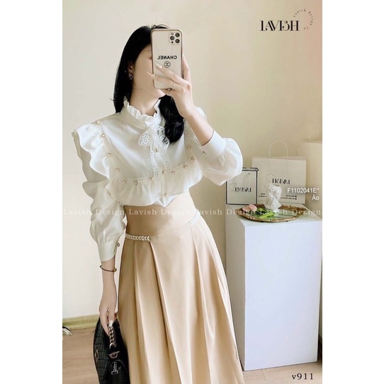 Áo sơ mi trắng nút ngọc