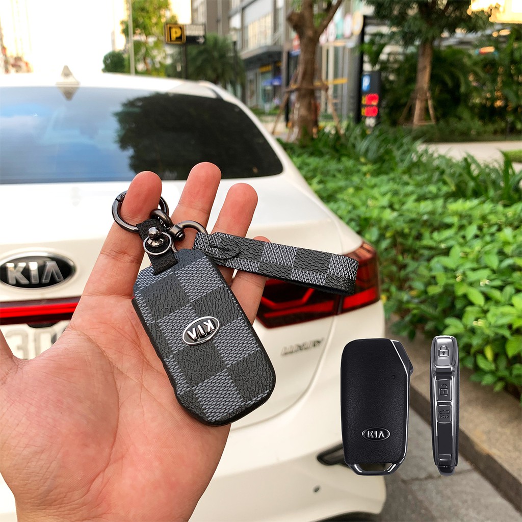 Đựng smartkey Kia Cerato 3 nút bấm handmade da LV KC3V AD có tay cầm