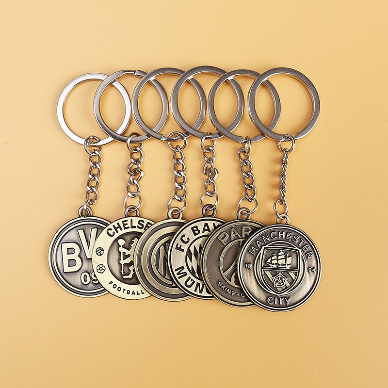 Móc Khóa Hình Logo Đội Bóng Real Madrid Bằng Đồng