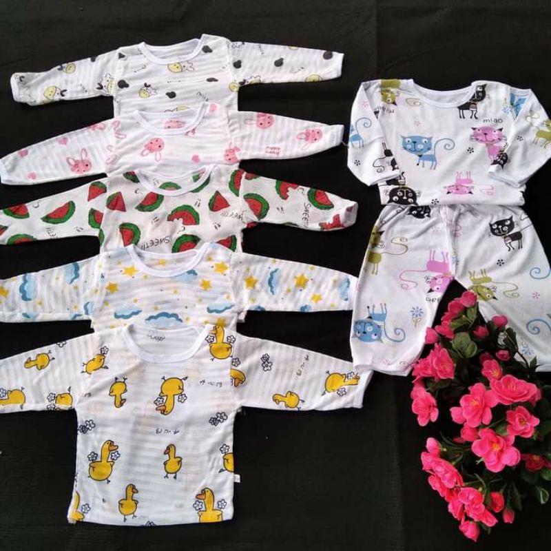Bộ cotton giấy dài tay khuy vai cho bé
