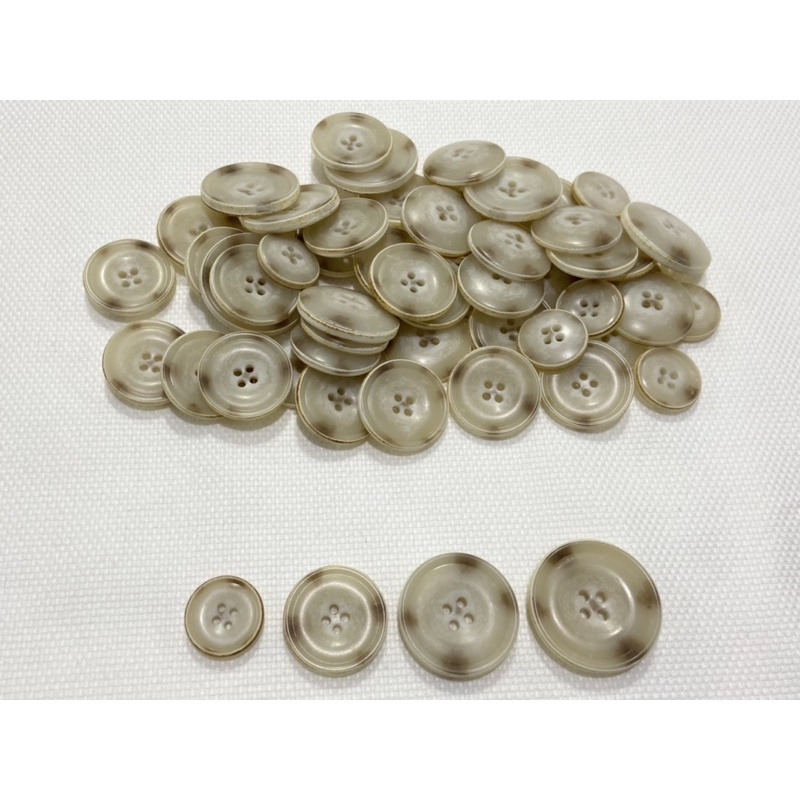Nút bụi / Nút áo vest nhựa màu loang NB6-09