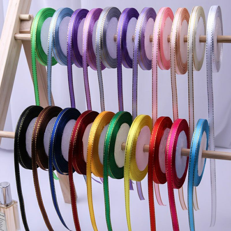 1 lốc 10 cuộn ruybang 1cm viền kim tuyến