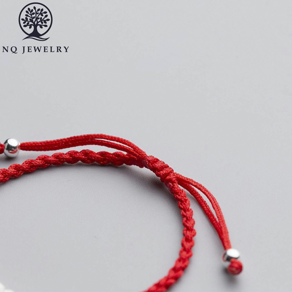 Vòng thắt dây đỏ bi cát - NQ Jewelry