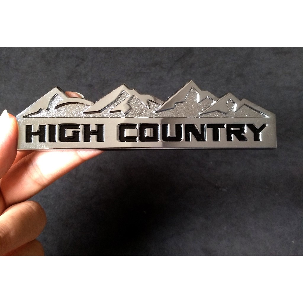 Logo kim loại chữ nổi HIGH COUNTRY dán ô tô