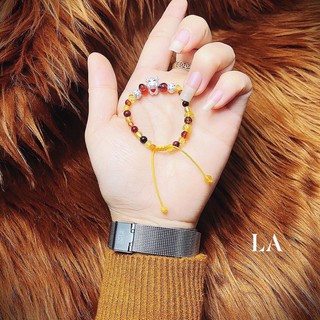 Lắc tay hổ phách mix charm bạc ( giáp trâu)