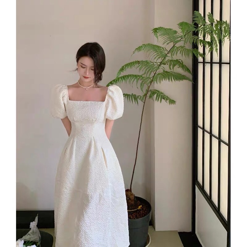 Váy trắng tiểu thư cổ vuông sẻ tà siêu sang chảrh