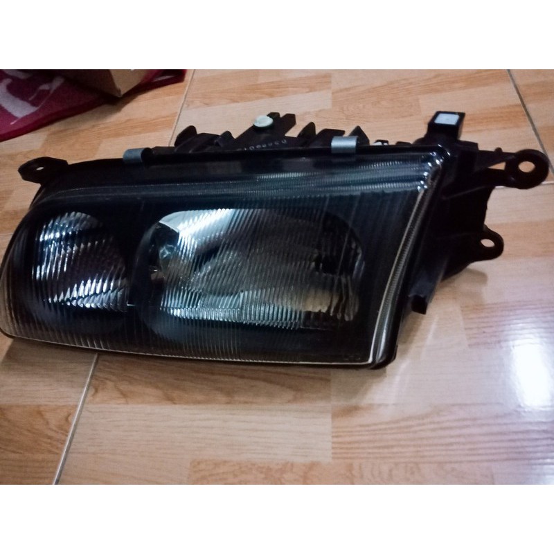 Đèn pha Mazda 626 đời 1997-2000 -tặng vòng xoay hương hoa