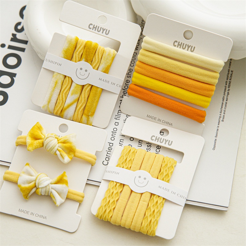 Dây Buộc Tóc Co Giãn Đính Nơ Màu Vàng Kẹo Dễ Phối Đồ Thời Trang Cho Nữ