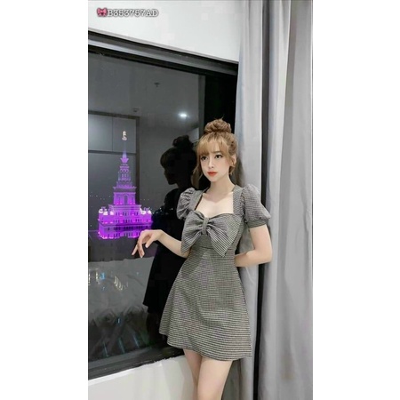đầm sọc thắc nơ
