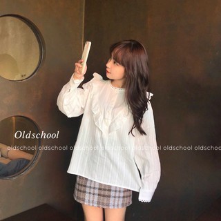 Áo babydoll bèo ngực tay dài, áo sơ mi cổ bèo chéo ngực.