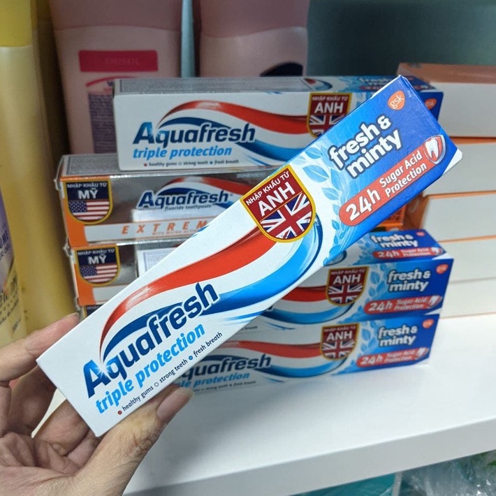 Kem đánh răng Aquafresh Triple Protection Cavity bạc hà làm trắng răng, ngăn ngừa sâu răng 100g