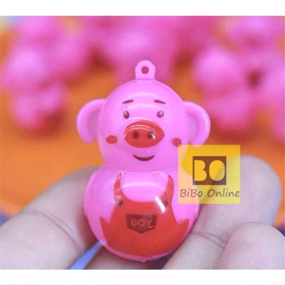Chú heo lật đật đáng yêu .ko bao giờ ngã