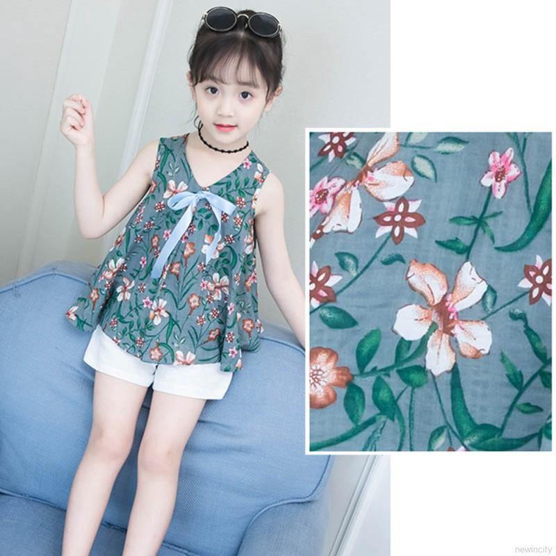 Bộ áo sát nách in hoa + quần ngắn màu trắng cho bé gái