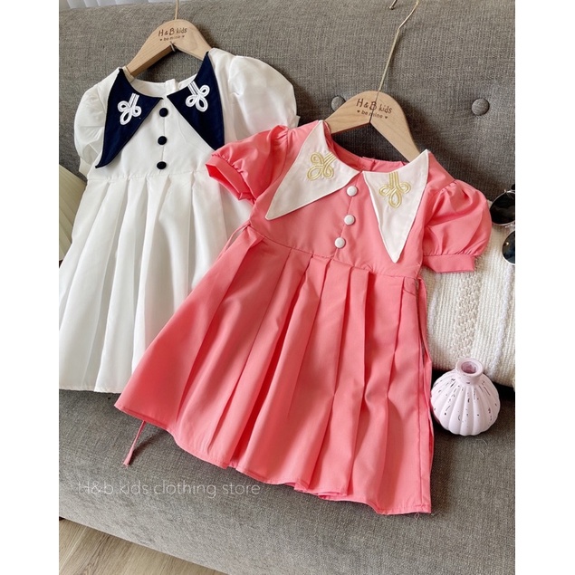 Xả Váy cổ nhọn thêu 2 màu cho bé gái