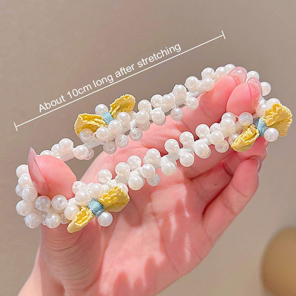 Dây Cột Tóc Co Giãn Hình Nơ Ngọt Ngào Cho Nữ