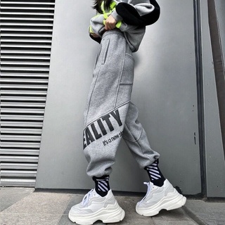 Quần thun vải dày dặn bo ống may hoạ tiết unisex