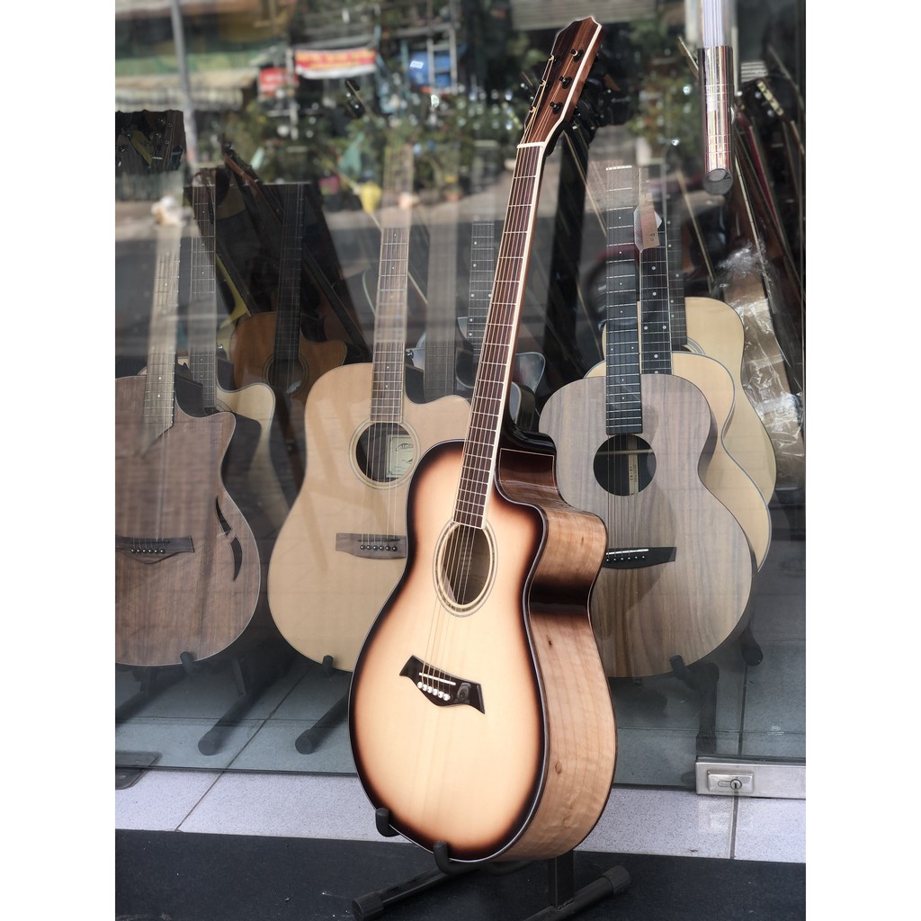 GUITAR VIỆT NAM GỖ CÒNG CƯỜM