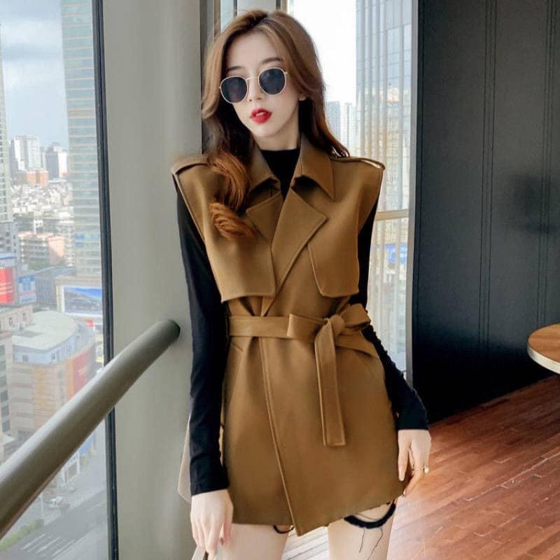 Áo dạ gile 2 lớp đai nơ eo. Chất liệu dạ ép mặt mịn.