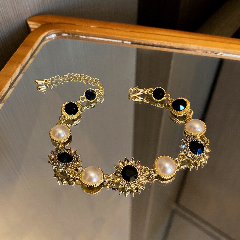 Vòng Tay Ngọc Trai Mặt Hoa Tròn Thời Trang Hàn Quốc