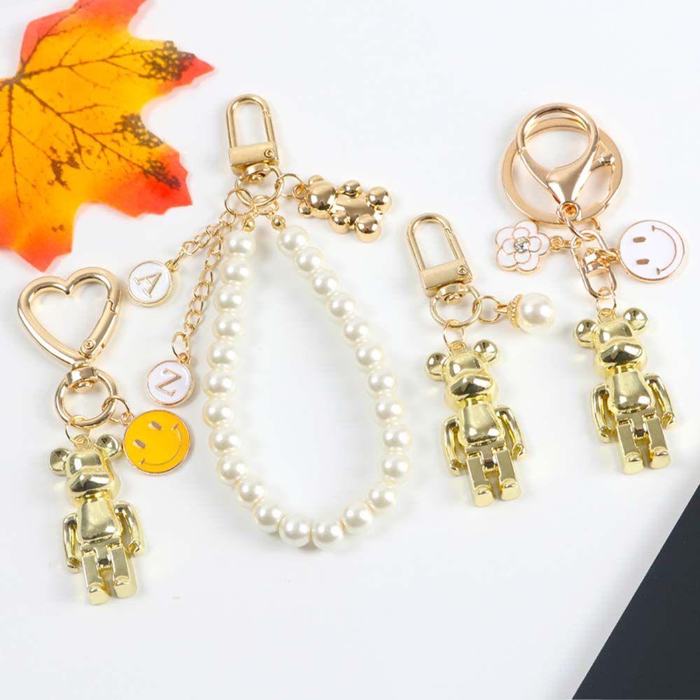 IVORY  Ok ​ Thời trang gấu xếp hàng chữ ith thời trang
